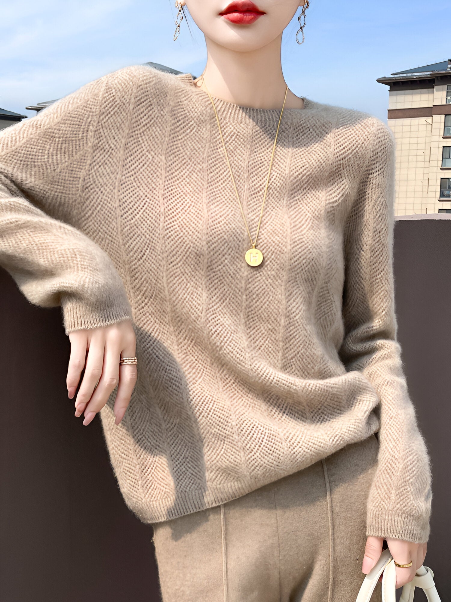 Mika™ - Pull en laine mérinos avec d'élégantes découpes