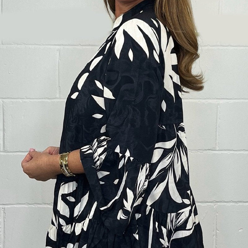 Alix™ - Blouse Élégante à Manches Évasées et Col V