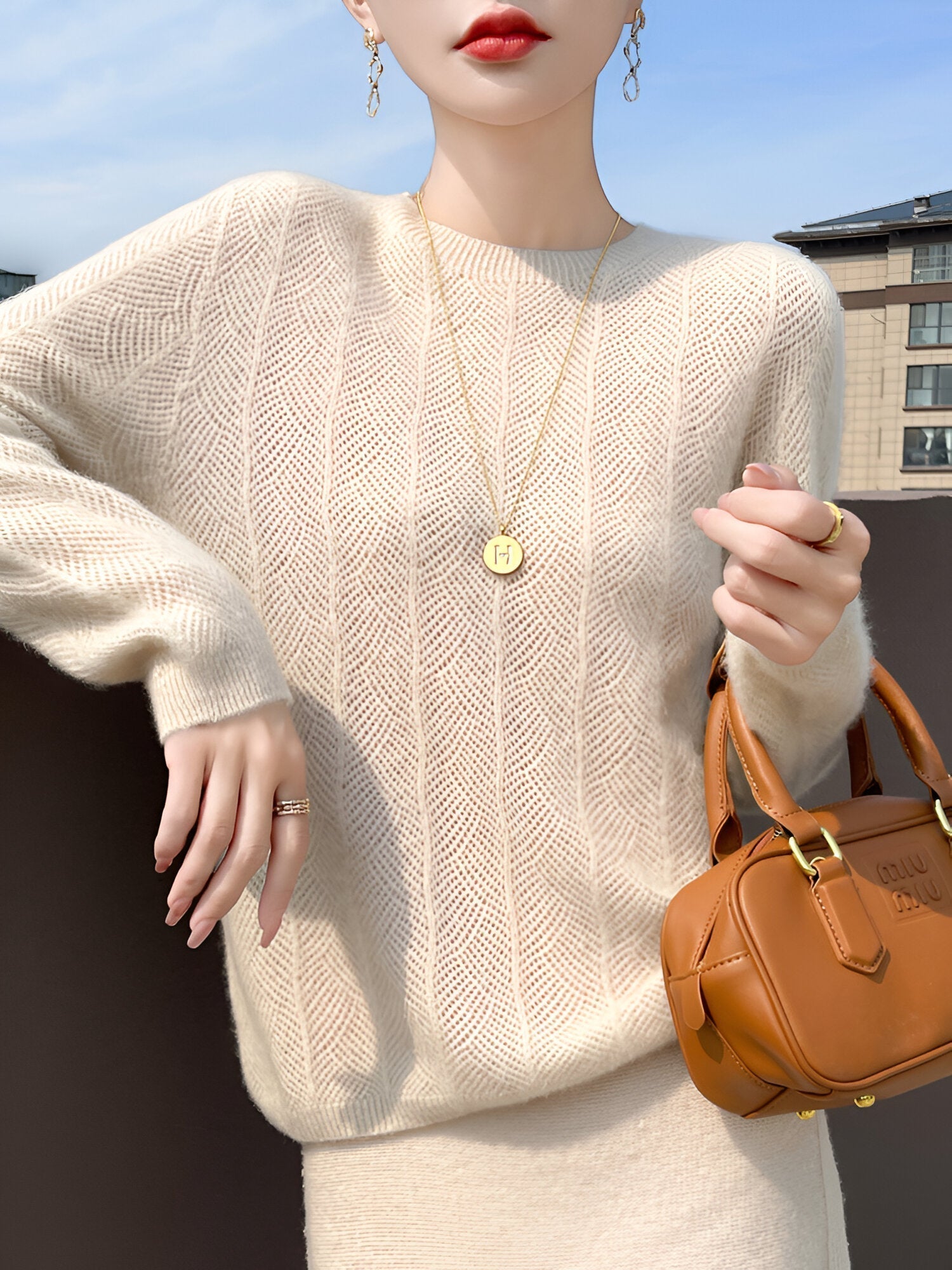 Mika™ - Pull en laine mérinos avec d'élégantes découpes