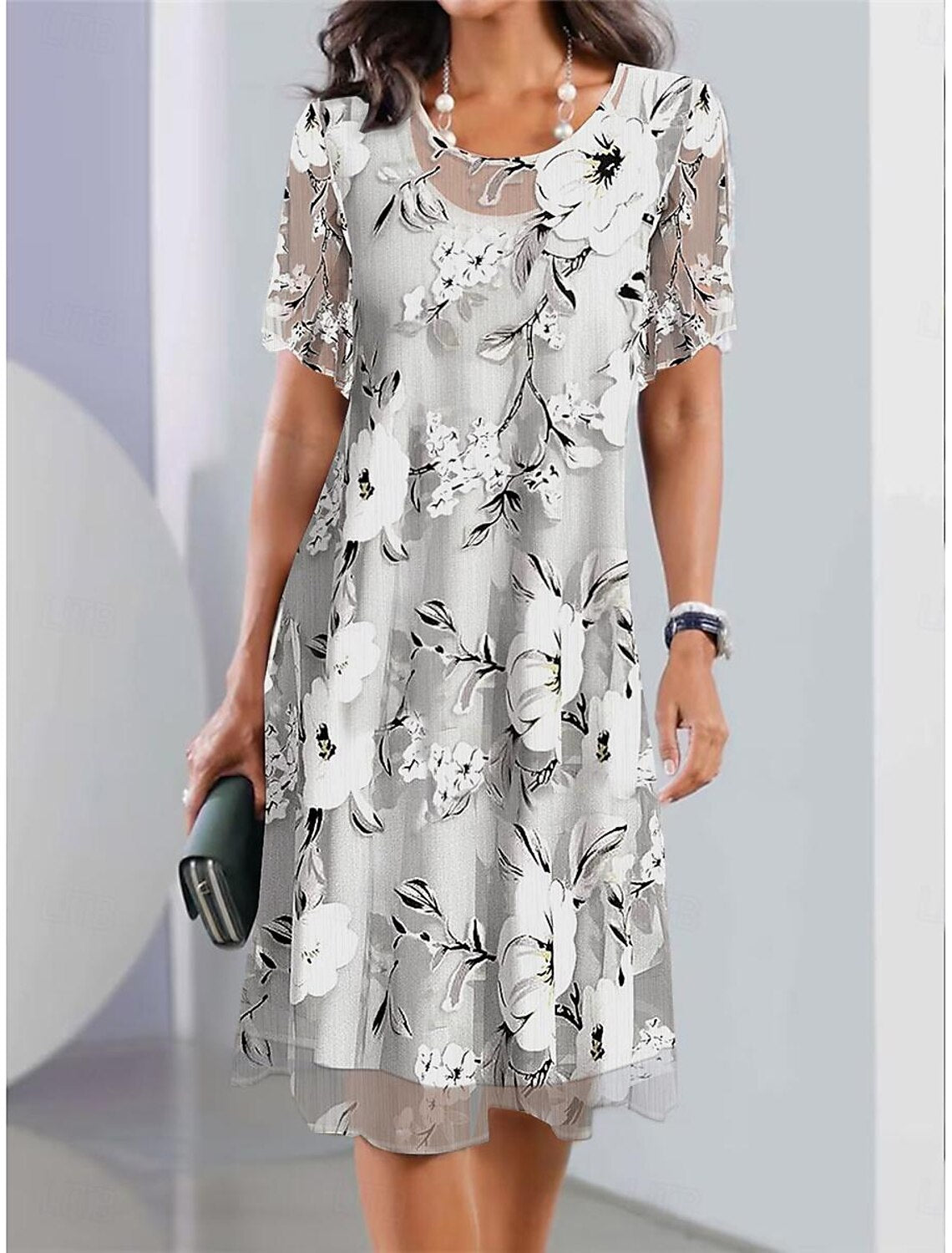 Serenella™ - Robe Midi Plissée à Imprimé Floral pour un Style Élégant et Confortable